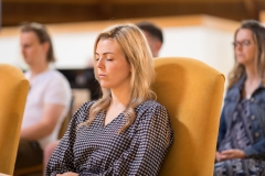 Shauna in group meditation